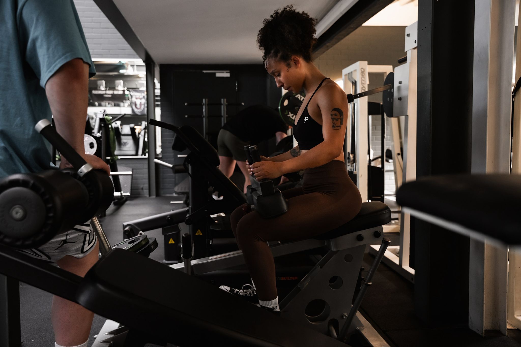 Me pressing dumbbells while coaching a chest session